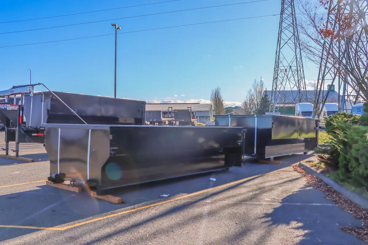 Roll-off dumpster ready for waste disposal at job site for 12 Yard Dumpster Rental in Coral Hills
